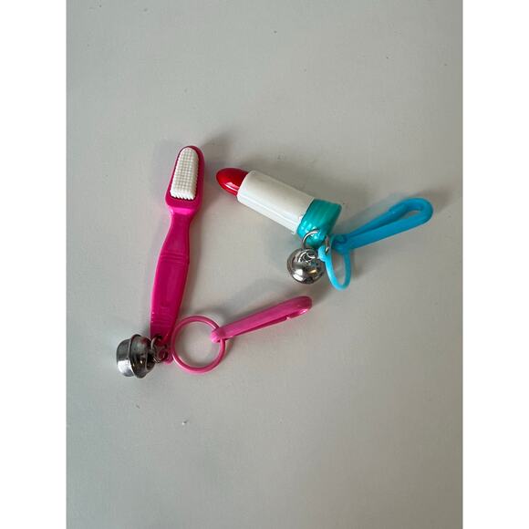 Toothbrush and Lipstick 1980s Bell Clip Charm Necklace Keychain Bell Lot - Picture 1 of 2